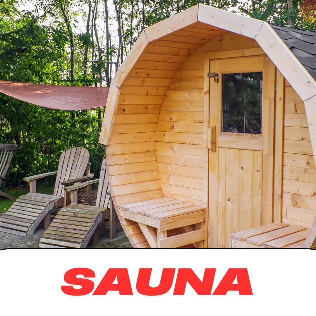 Wooden outdoor sauna with a rounded design, featuring a glass door, surrounded by wooden lounge chairs in a lush garden se...